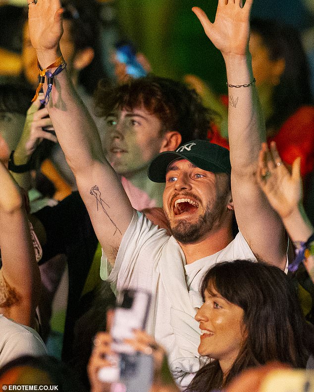 Paul couldn't wipe the smile off his face as he raised his arms in the air during the festival.