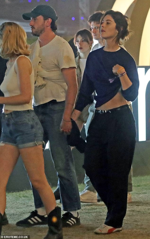 The couples spent the night partying together and were later spotted socializing outside the festival.