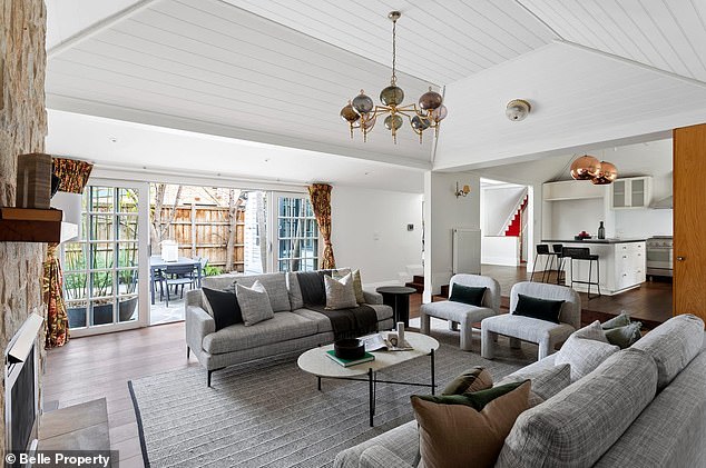 The 59-year-old comedian has lived on the property with her four children and husband Peter Lewis for 16 years. Pictured: the beautiful sunken living room