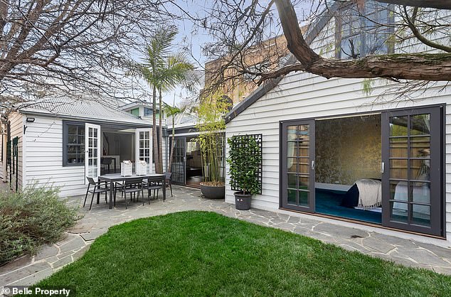 Since moving in, Kate and her partner have made significant improvements to the apartment, including installing an extension. Pictured: the incredible outdoor entertaining patio