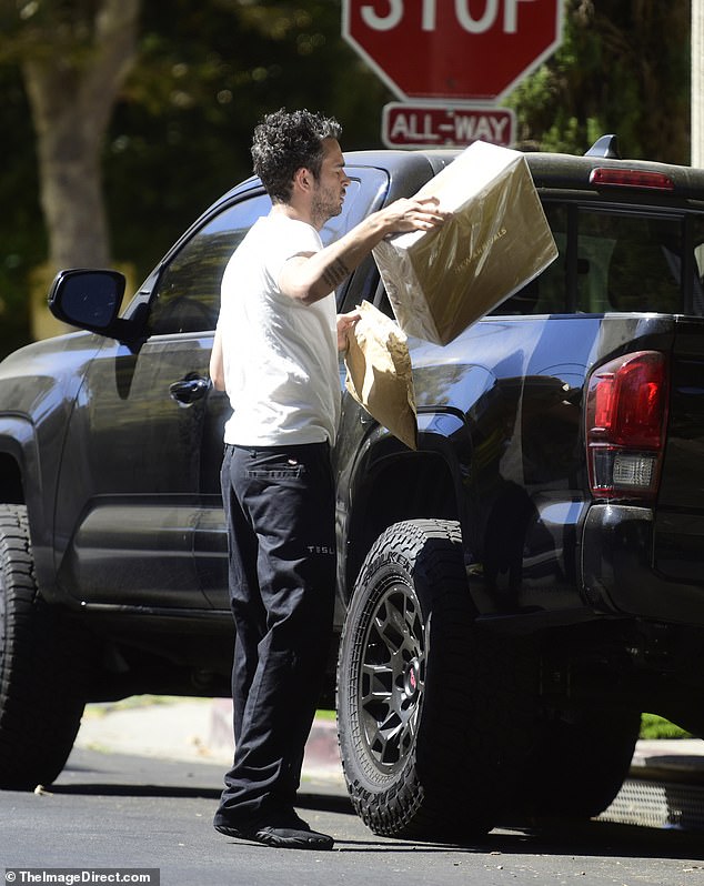 Matty looked nervous as he lifted boxes and bags from his car and carried them to his new home.