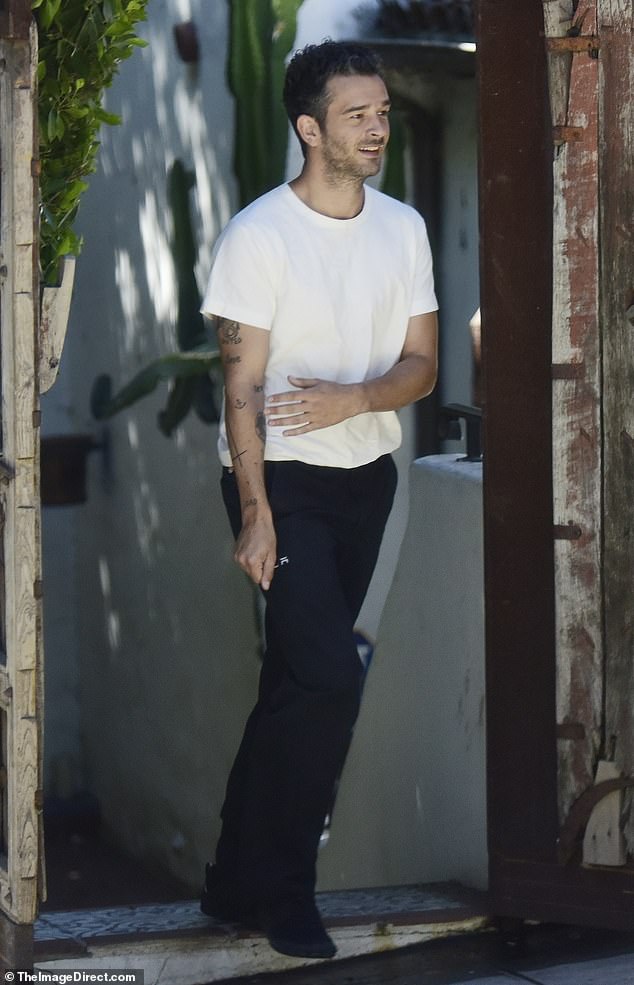 Meanwhile, a tired Matty put on a pair of black trousers and a loose white T-shirt.