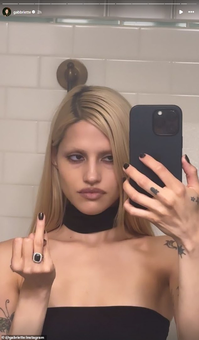 The singer and model sparked engagement rumours after she posted a photo on Instagram of herself sporting a £10,000 black diamond ring on her ring finger.