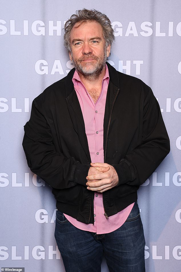 Actor Brendan Cowell (pictured) showed off his handsome physique as he sported a pink shirt, black quilted jacket and blue jeans.