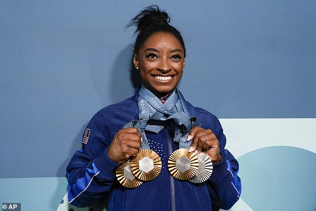 She won three gold medals (in the team event, all-around and vault) and took silver on the floor.