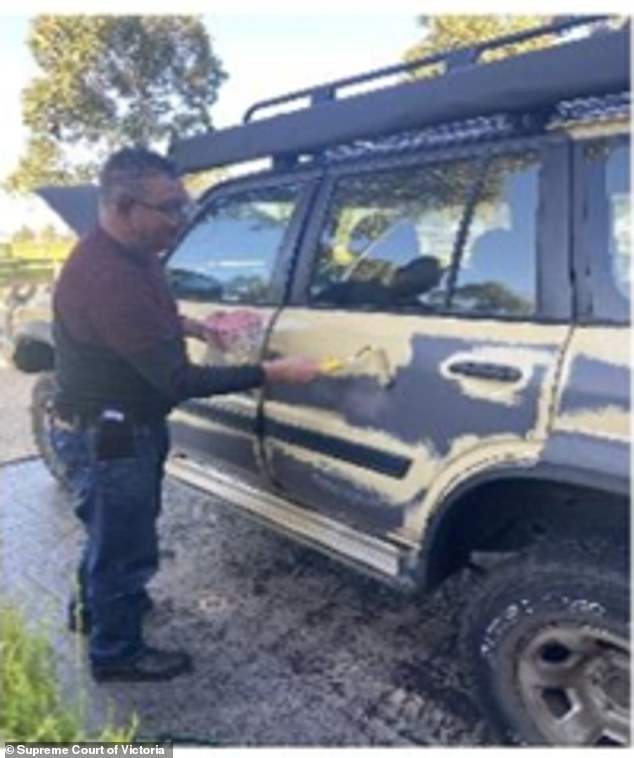 Lynn paints over her 'killer car' outside her Caroline Springs home after murdering Carol Clay