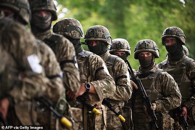 Ukrainian soldiers take part in a casualty simulation training exercise operated by the British armed forces, as part of the Interflex programme, in southern England, August 22, 2024.