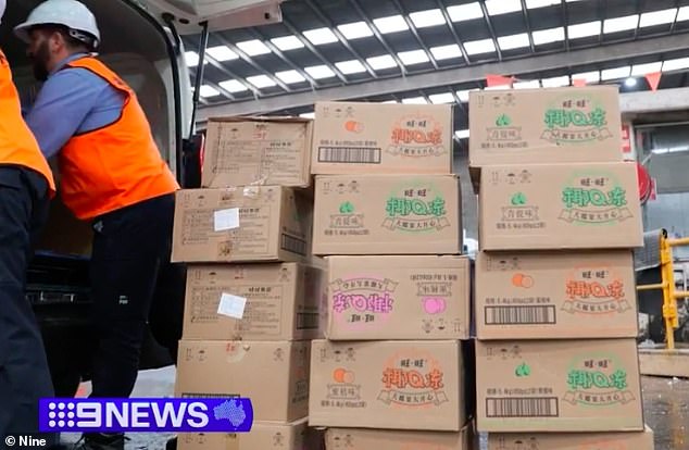 The sale and import of gelatin capsules has been illegal for more than 20 years because they use a binding agent called konjac (pictured, investigators during raids in western Sydney).