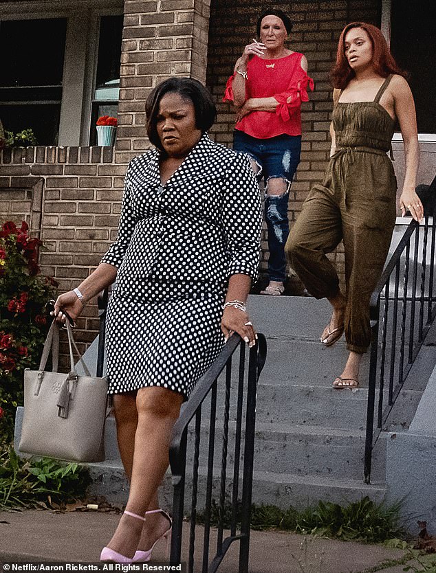 Directed by Lee Daniels, the Netflix horror film stars Glenn with Andra Day (right) and Mo'Nique (left) in the story of a family battling a demon in a haunted house.