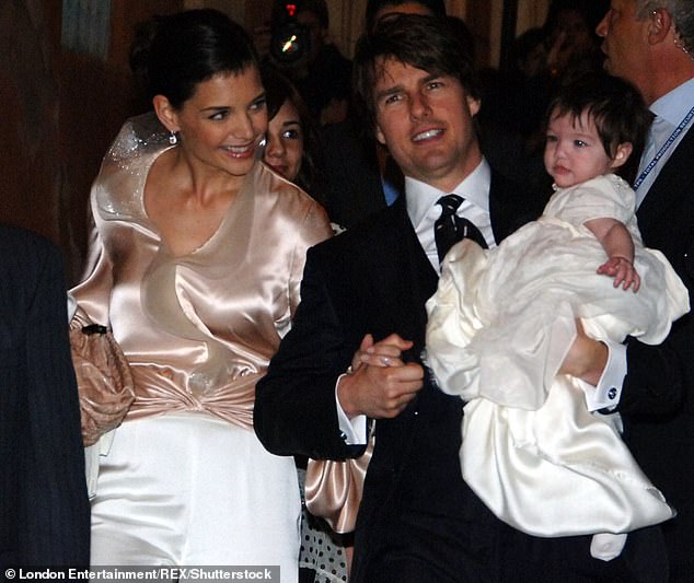 Cruise and Holmes with Suri at Nino's restaurant at the foot of the Piazza De Spagne (Spanish Steps) in Rome, Italy, two days before their fairytale wedding in November 2006.