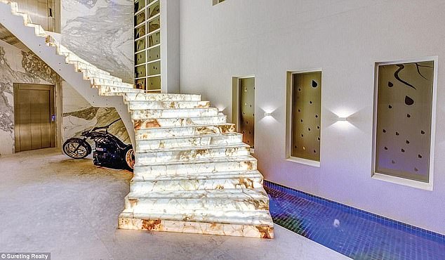 The highlight of the house, a Persian onyx staircase that appeared in a music video by American rapper Bow Wow, marked the beginning of Mehajer's financial ruin.