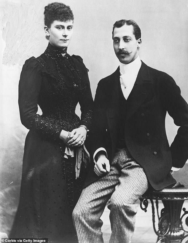 George V's elder brother Eddie, Duke of Clarence, first proposed to her, but died at the age of 28. Above: Mary and Eddie together