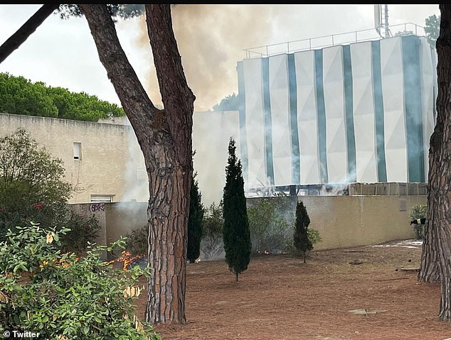 Firefighters, police and police arrived at the scene near the synagogue at around 8.40am local time today. The fire has now been brought under control and no injuries have been reported (pictured: smoke rising into the air)