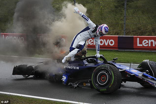 The American driver jumped out of the car immediately after being told his car was on fire.