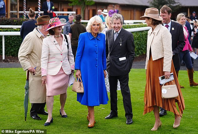 The royal was spotted with William Derby, who is the chief executive of York Racecourse, and wearing her ruby, diamond and sapphire horseshoe brooch.