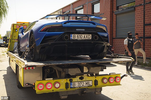 This Lamborghini Huracan was also placed on the back of a truck. Its value is around £235,000.