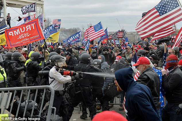 Moore issued a dire warning, writing that he, more than anyone, understands how fractured things are in the United States, and identified former President Donald Trump as an instigator of this division. He believes there is a dividing line between white supremacists and January 6, pictured above.