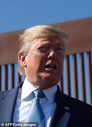 Trump stands in front of a similar section of wall in Otay Mesa, California, on September 18, 2019.