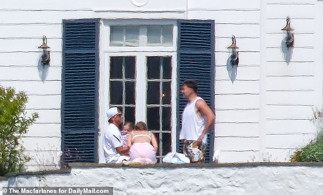 Travis and Taylor were seen chatting with Bronze, Patrick and Brittany's youngest son.