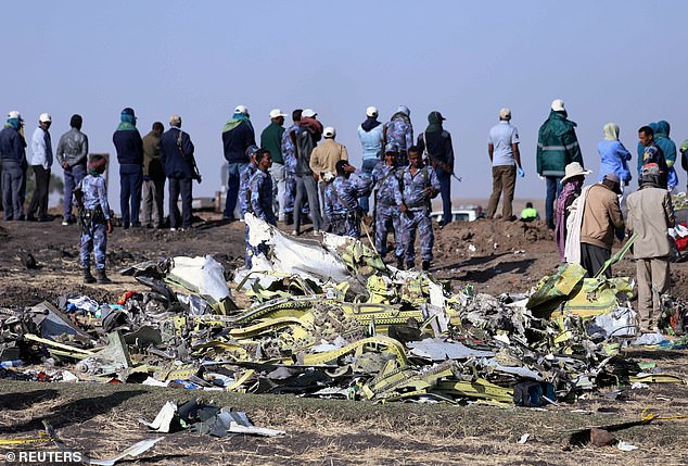 Pictured: The crash site of Ethiopian Airlines Flight 302. The plane was a Boeing 737 MAX 8 and crashed six minutes after takeoff on March 10, 2019. All 149 passengers and eight crew members were killed on impact.