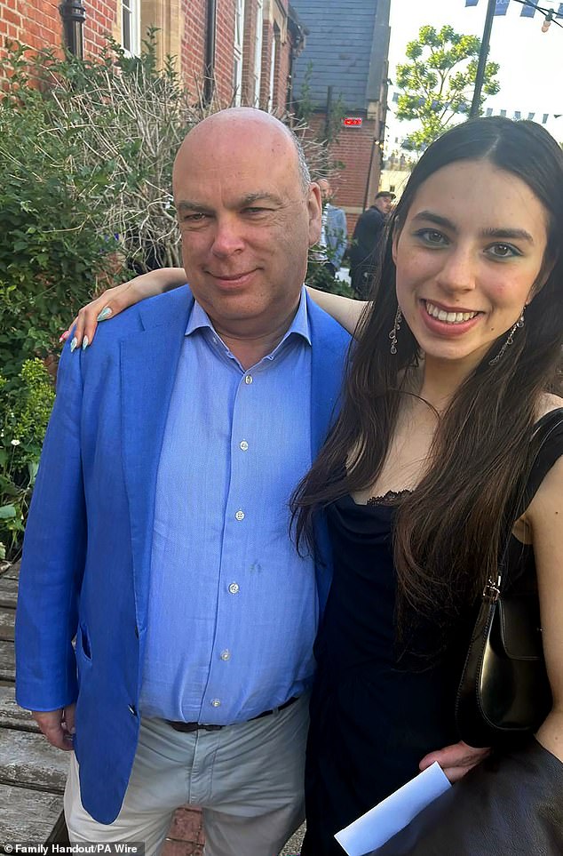 Mr Lynch is pictured with his daughter Hannah, who also died on the boat.