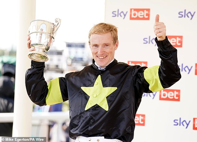 Winning jockey William Lee pictured celebrating after riding Magical Zoe to victory at York