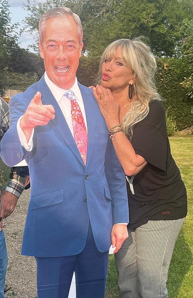 Jo Wood caused a stir on social media after posting this photo of herself over Nigel Farage's shoulder - but it was just a cardboard cutout.