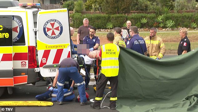 A 40-year-old woman is among several passengers who were taken to St George's Hospital (pictured, paramedics treating an injured passenger at the scene)