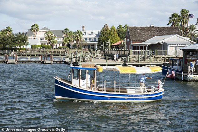 Pictured: A boat leaves Lake Sumter Landing Market Square