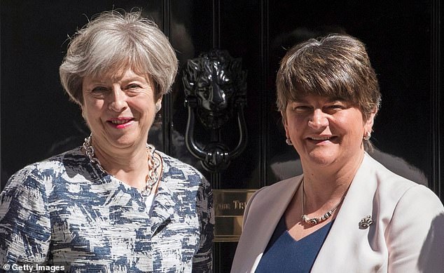 Priority: Baroness Foster with Theresa May in 2017, prefers to buy clothes on the High Street rather than online