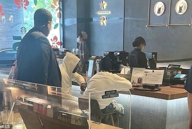 Kanye, pictured at a Starbucks in Seoul, was there for his Vultures 2 listening party with Ty Dolla $ign on Friday, which will be followed by another event in Taiwan on Sunday.