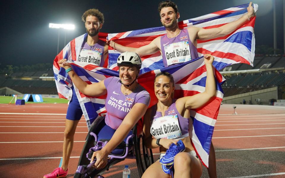 Cockroft with Team Great Britain silver medallists Zachary Shaw, Kevin Santos and Ali Smith after the 4x100m world relay final at the World Para Championships in Kobe, Japan.