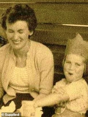 Lorraine said her family was her greatest joy, with four daughters, ten grandchildren and 18 great-grandchildren; she is pictured here in the 1950s with her daughter Jenny.