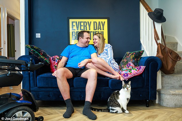 Erica Crompton at home with her partner, Paul, who has helped her feel comfortable in her own body.