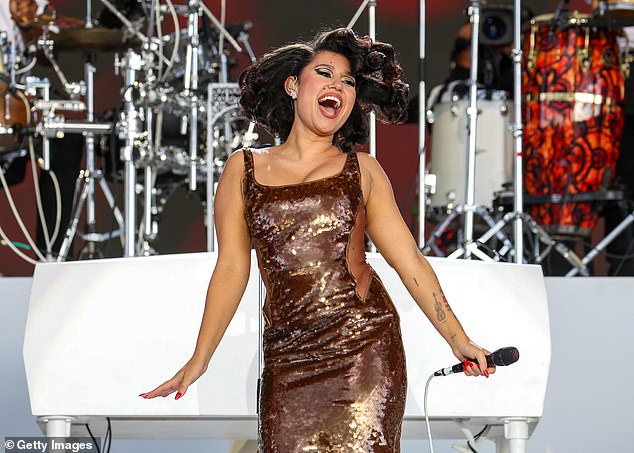 The six-time Brit Award-winning singer stunned at the festival in a chocolate brown sequin dress.