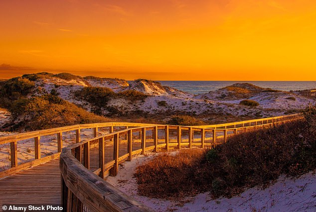 Sunset on the boardwalk leading to Rosemary Beach