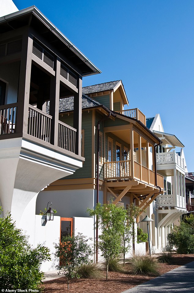 A row of houses facing the afternoon sun in Rosemary Beach, Florida