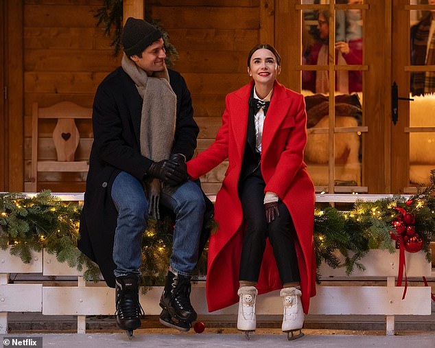 As for Emily and her on-again, off-again romance with Gabriel (Lucas Bravo), a snapshot of the duo holding hands at the edge of an ice-skating rink on Christmas Day indicates that the fire may be burning brightly between the two star-crossed lovers.