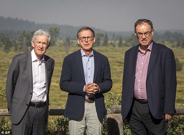 Federal Reserve Chair Jerome Powell, left, Bank of Canada Governor Tiff Macklem, center, and Bank of England Governor Andrew Bailey pose for a photo at the Fed's annual retreat in Jackson Hole on Aug. 23, 2024. At this meeting, Powell signaled that a policy shift is coming.