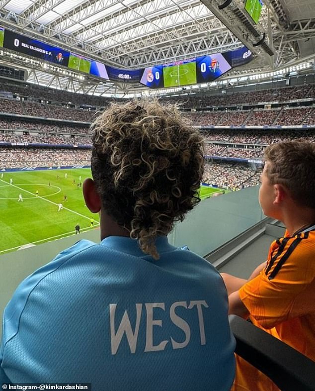 Kardashian then shared a photo of Saint watching the game from the stands.