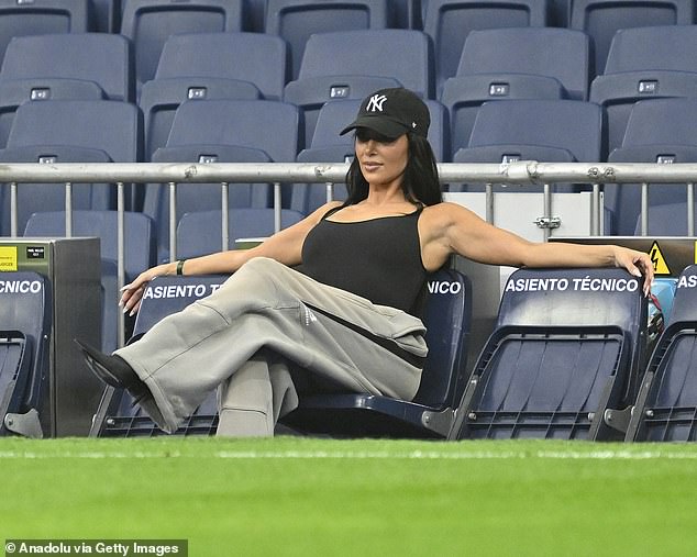 Kim watched her son from the sidelines.