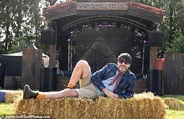 The Cotswolds event is known for its friendly atmosphere and excellent food, and is attended by up to 25,000 people a day (pictured: farm owner Alex James)