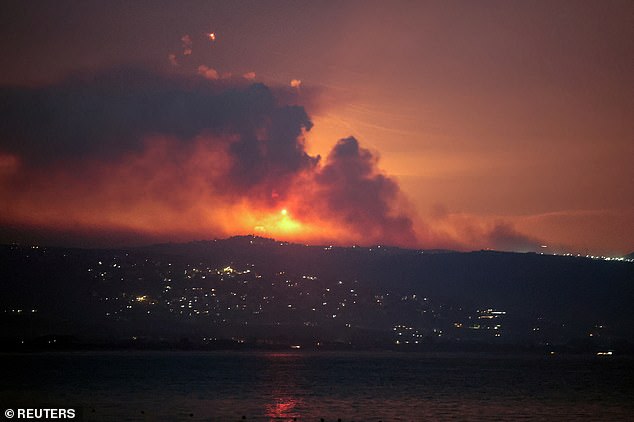 A view shows smoke and fire on the Lebanese side of the border with Israel.