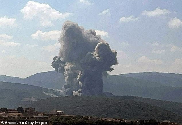 Smoke rises after an Israeli airstrike hit the town of Zibqin in southern Lebanon on August 25.