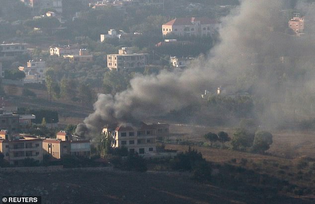 Smoke rises from the town of Khiam in southern Lebanon amid ongoing cross-border hostilities between Hezbollah and Israeli forces, as seen in Marjayoun, near the border with Israel, on August 25, 2024.