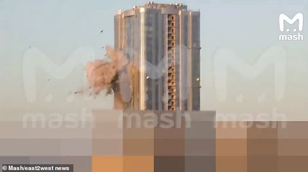 Video that Russian Telegram channels SHOT and Mash identified as a high-rise residential building in the city, with one side damaged and several windows blown out on three floors.