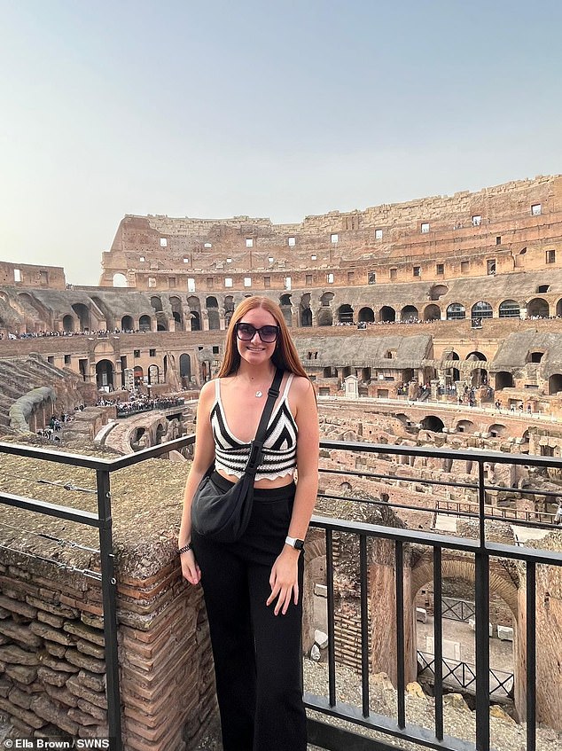 The enthusiastic traveller Ella is seen here at the world-famous Colosseum in Rome.