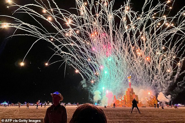 A security guard keeps people away during the annual Burning Man Festival on September 4, 2023