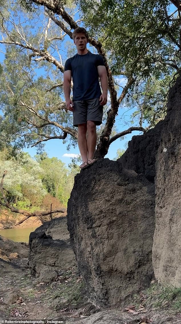 Eagle-eyed fans were quick to comment on Robert's impressive muscled arms as he stood on a large rock.