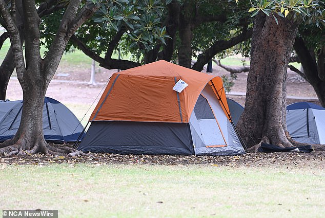 Mark from Hobart wants to help people: the tent he rents in his backyard for $125 a week includes all expenses except food (pictured: homeless people camping in a city park)